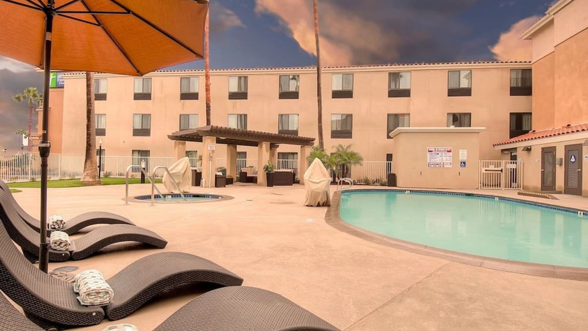 Outdoor pool at Holiday Inn Express Hotel & Suites Carlsbad Beach.