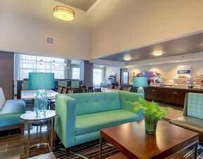 Lobby seating at Holiday Inn Express Hotel & Suites Carlsbad Beach.