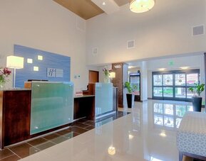 Reception desk at Holiday Inn Express Hotel & Suites Carlsbad Beach.