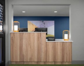 Reception desk at Spark By Hilton Tucson Airport.