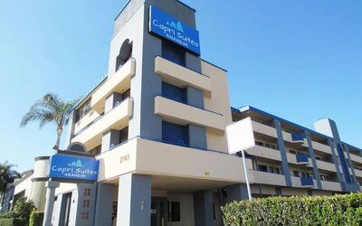 Hotel exterior at Capri Suites Anaheim.