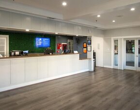 Reception desk at Capri Suites Anaheim.