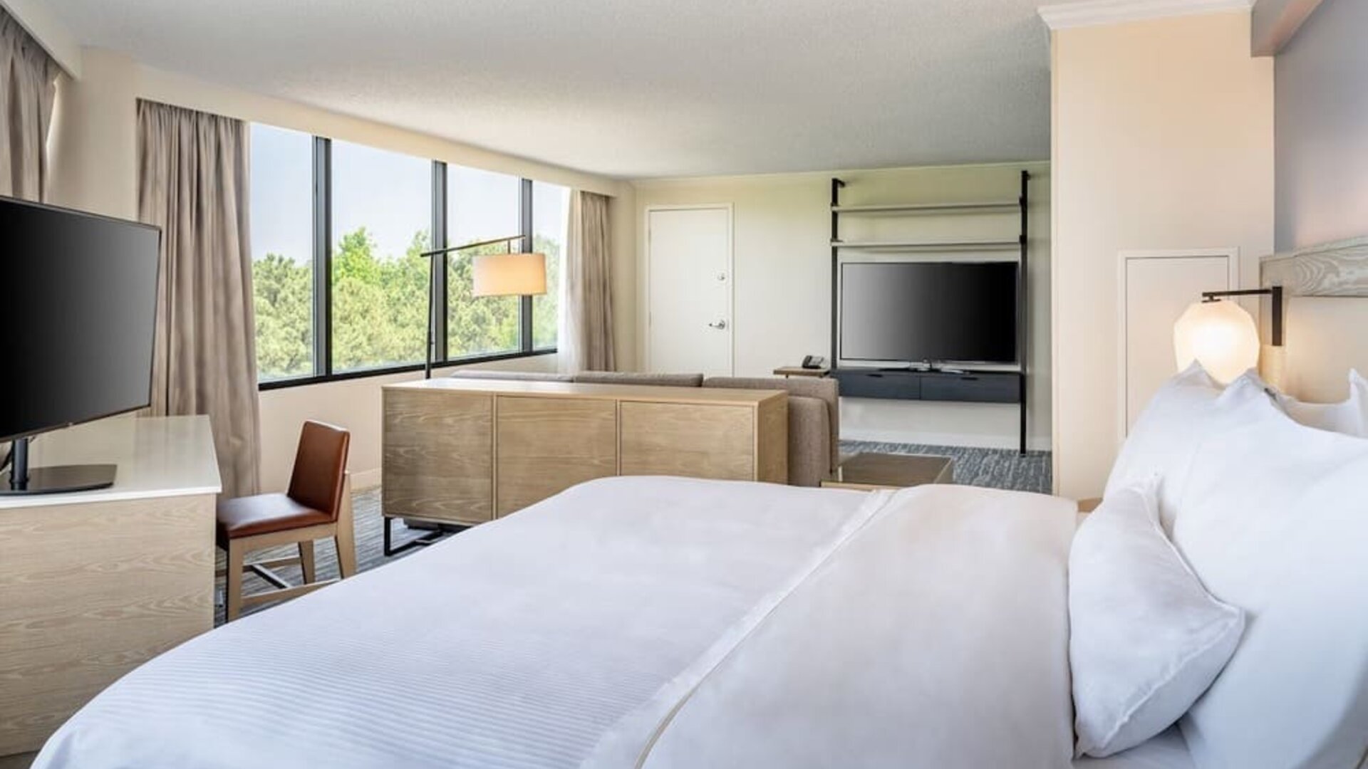 Guest room with living room at Westin Atlanta Airport Hotel.