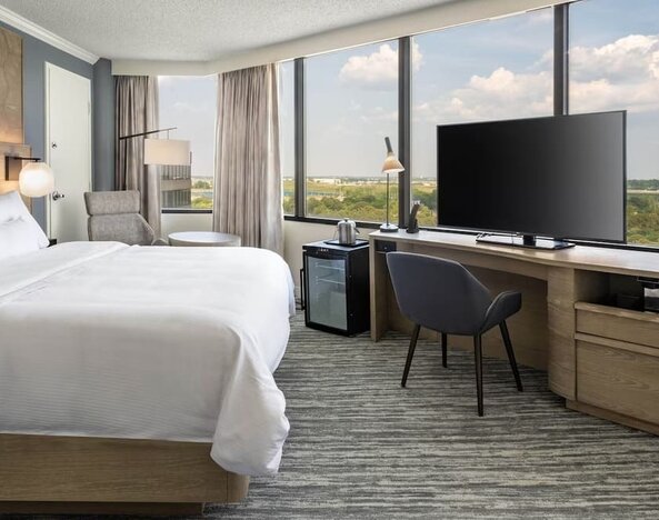 Double bed guest room with panoramic views at Westin Atlanta Airport Hotel.