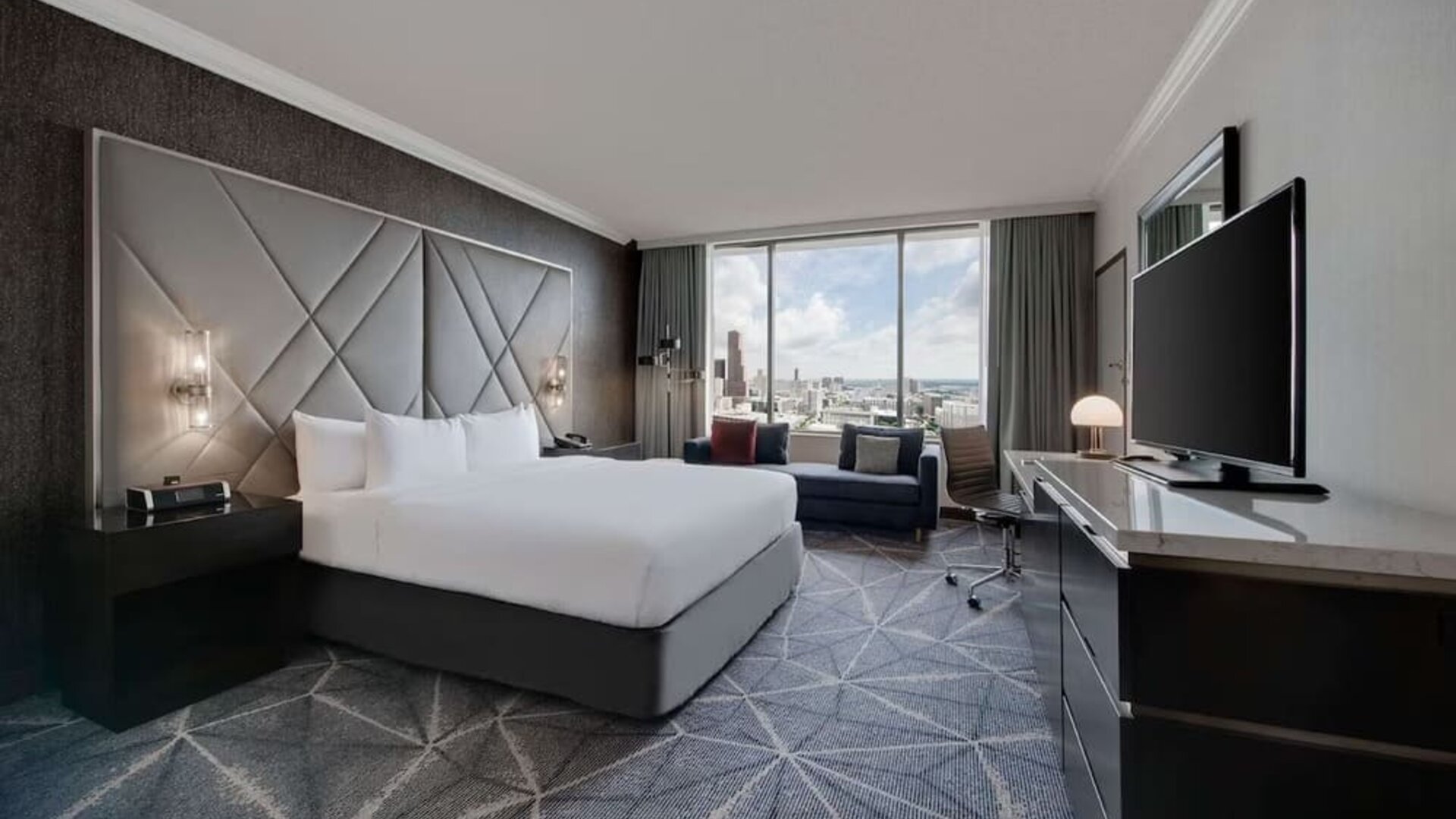 Day use room with work desk and sofa at Hilton Atlanta.