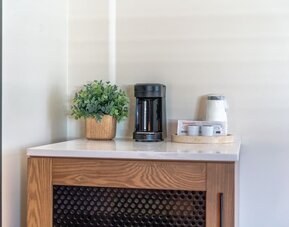 Coffee station at LYFE INN & SUITES By AGA.