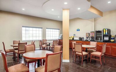Dining room at Days Inn By Wyndham San Antonio Near Fiesta Park.