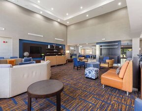 Lobby seating and coworking space at Best Western Plus Elgin - Chicago.