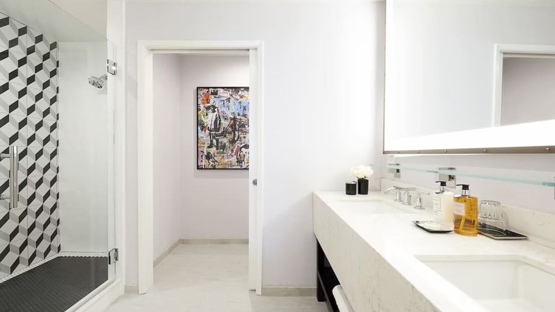 Private guest bathroom with shower and free toiletries at Montrose At Beverly Hills.