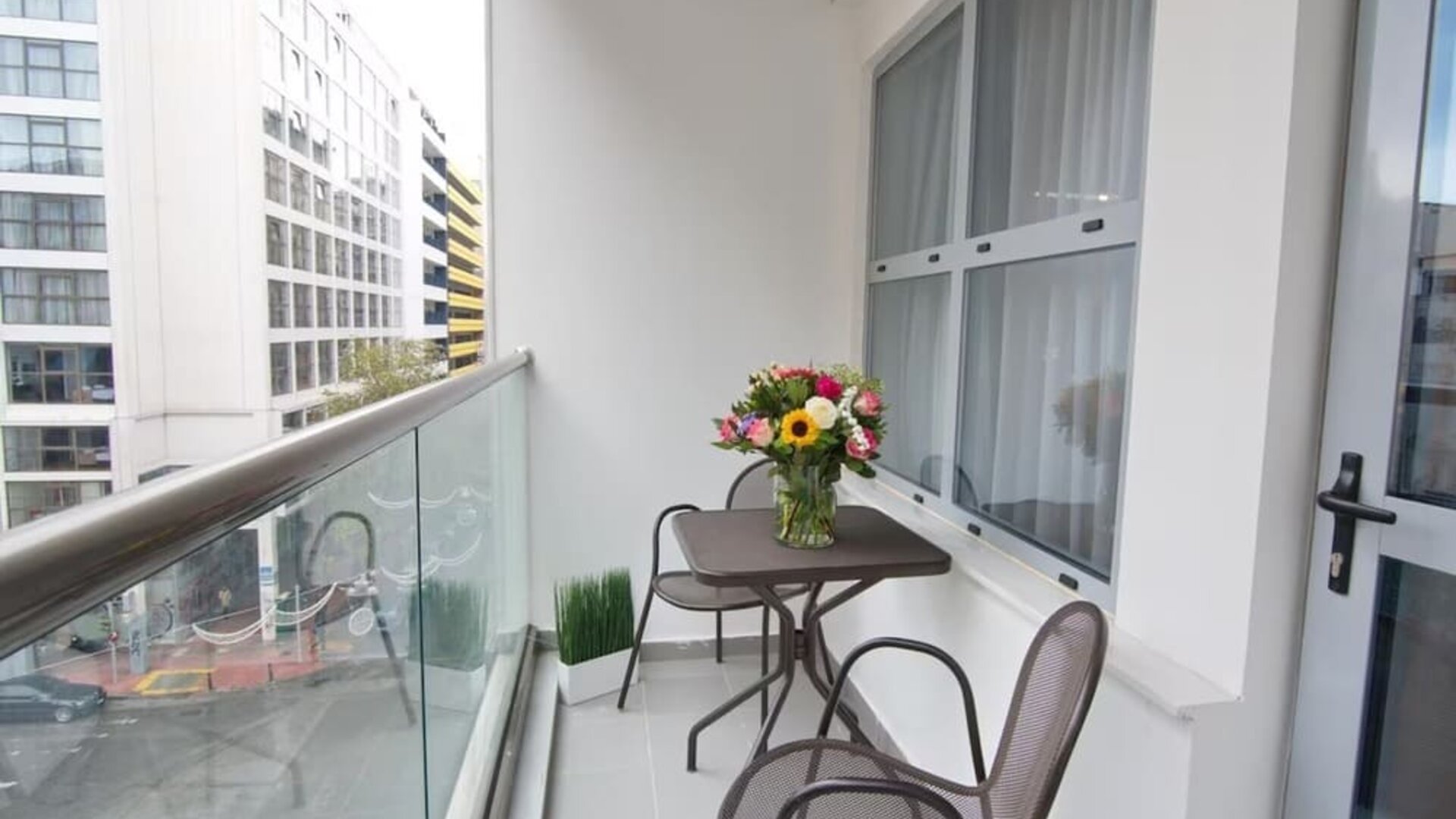 Outdoor balcony at Boss Boutique Athens.