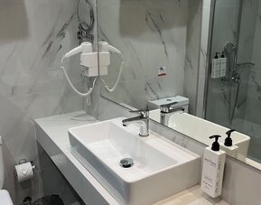 Guest bathroom at Boss Boutique Athens.