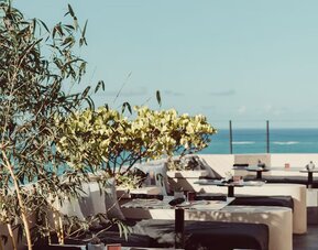 Outdoor dining and terrace at Aire De O:live.