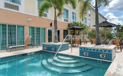 Outdoor pool at Sleep Inn & Suites Port Charlotte - Punta Gorda.