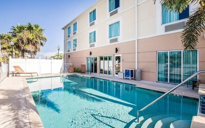 Outdoor pool at Sleep Inn & Suites Port Charlotte - Punta Gorda.