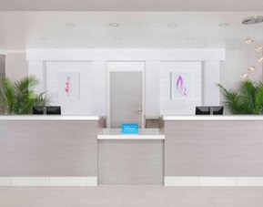 Front desk at Hilton Garden Inn Calgary Airport.