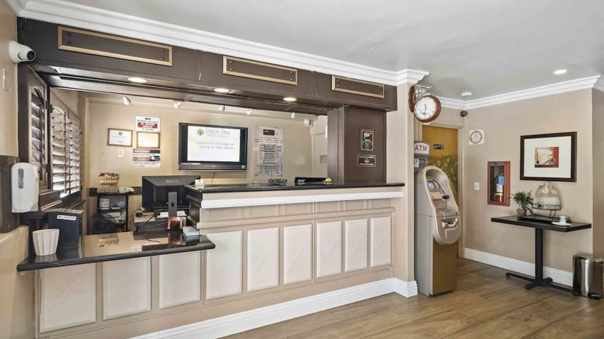 Reception desk at Lemon Tree Hotel & Suites Anaheim.