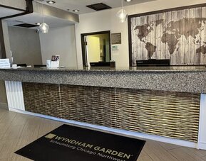 Reception desk at Wyndham Garden Schaumburg Chicago Northwest.