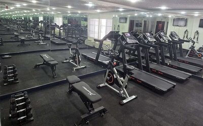 Fitness center at Quality Inn & Suites Irving DFW Airport South.