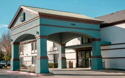 Hotel exterior at Quality Inn & Suites Irving DFW Airport South.