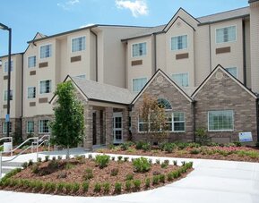 Hotel exterior at WeStay Suites Belle Chasse.