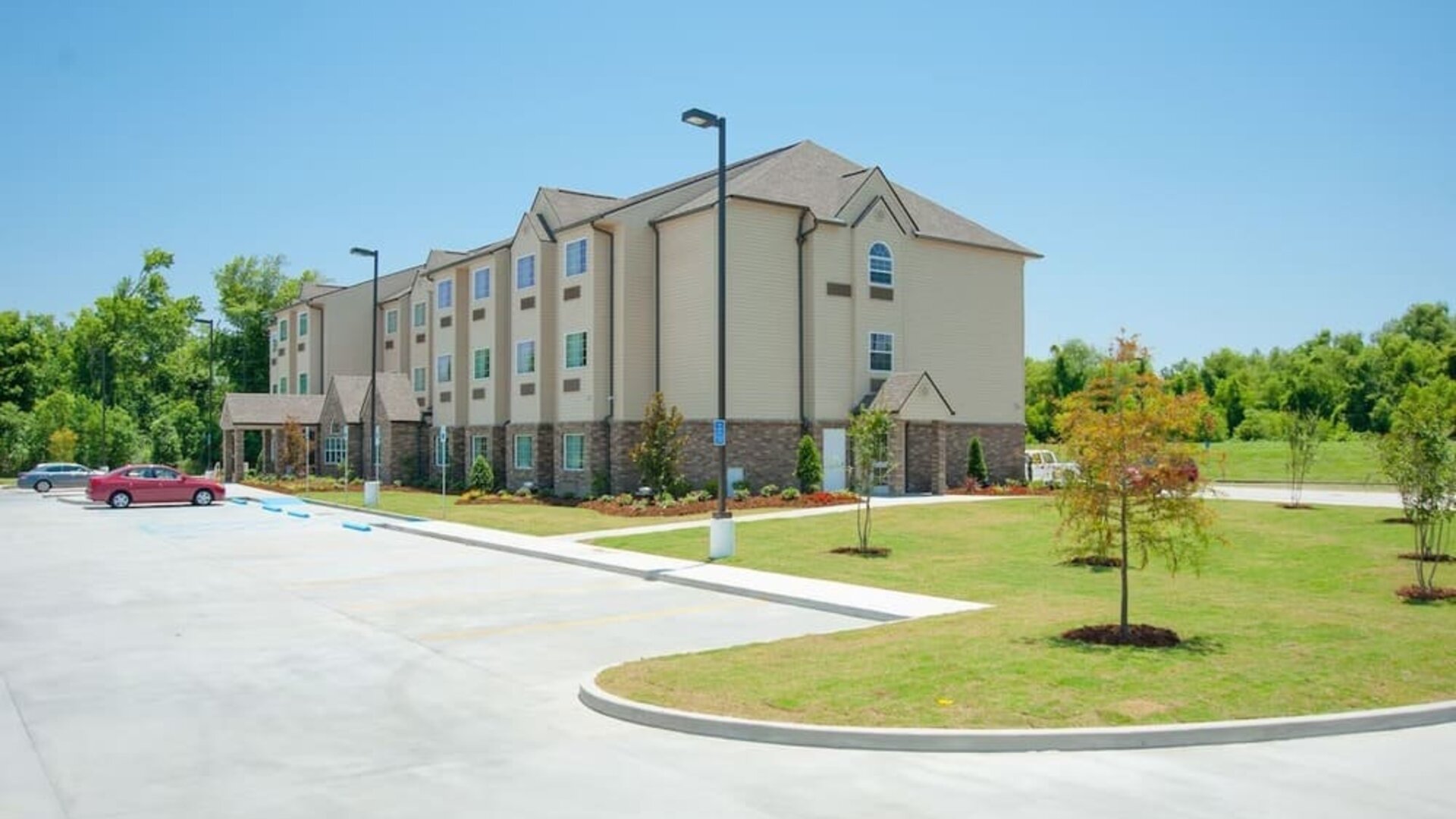 Hotel exterior at WeStay Suites Belle Chasse.