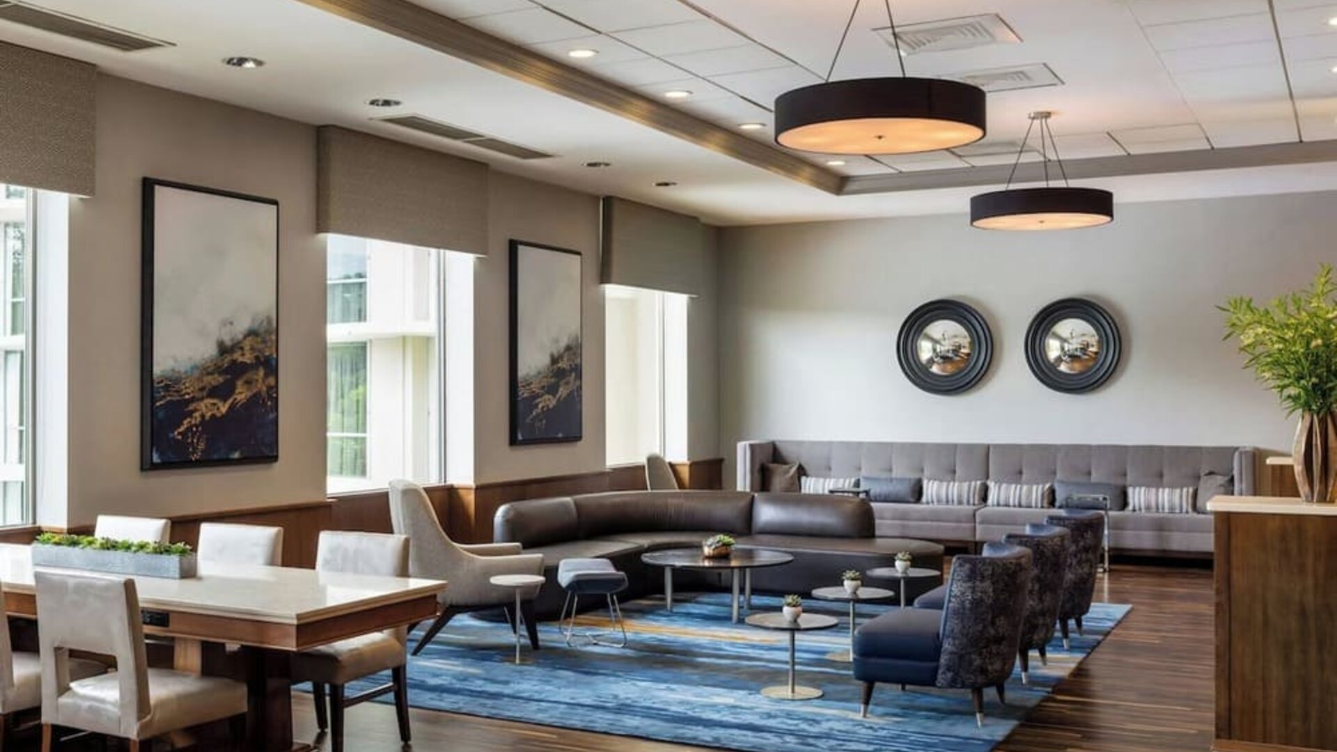 Lounge area with natural light at Boston Marriott Newton.