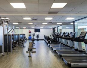 Fully-equipped fitness center at Boston Marriott Newton.