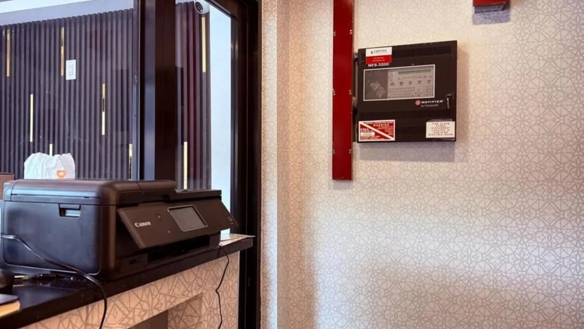 Reception desk at THE VINE HOTEL BRONX.