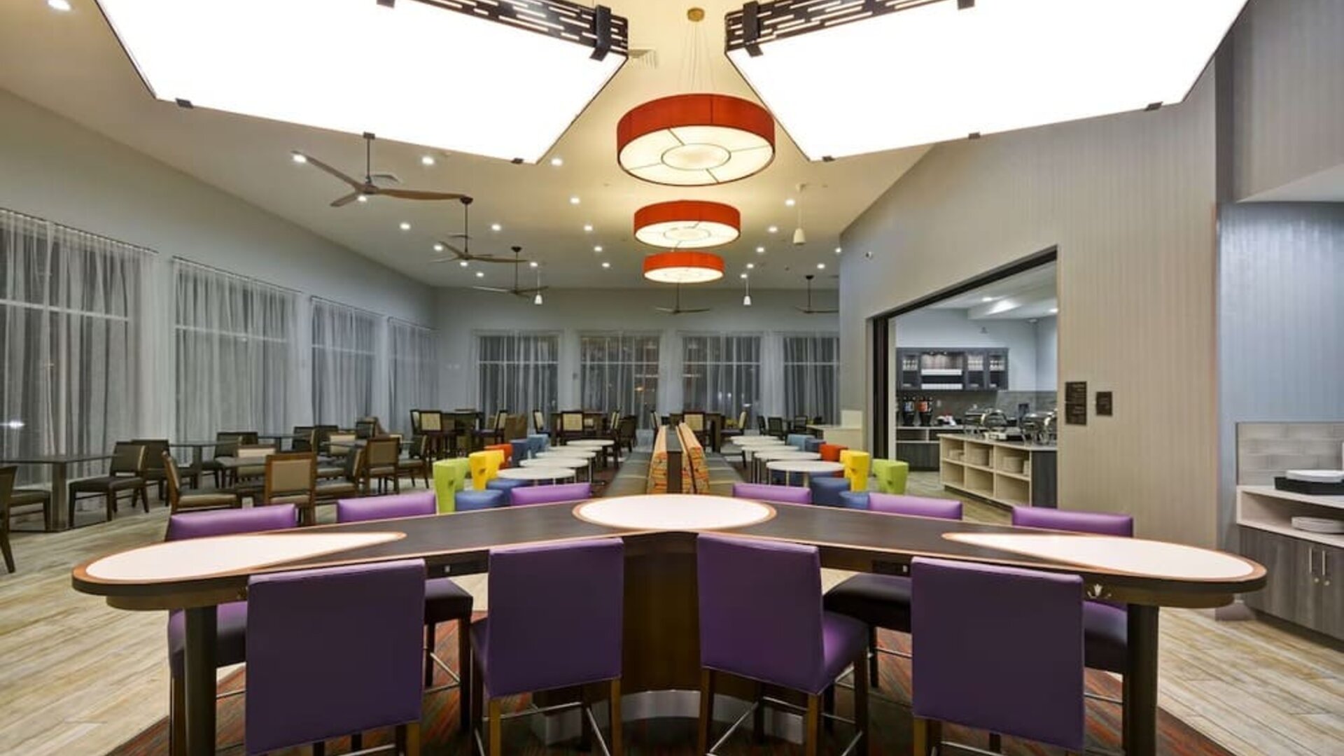 Lobby seating at Homewood Suites By Hilton Orlando Theme Parks.