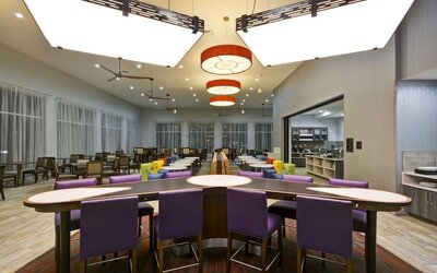 Lobby seating at Homewood Suites By Hilton Orlando Theme Parks.