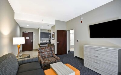 Lounge area at Homewood Suites By Hilton Orlando Theme Parks.