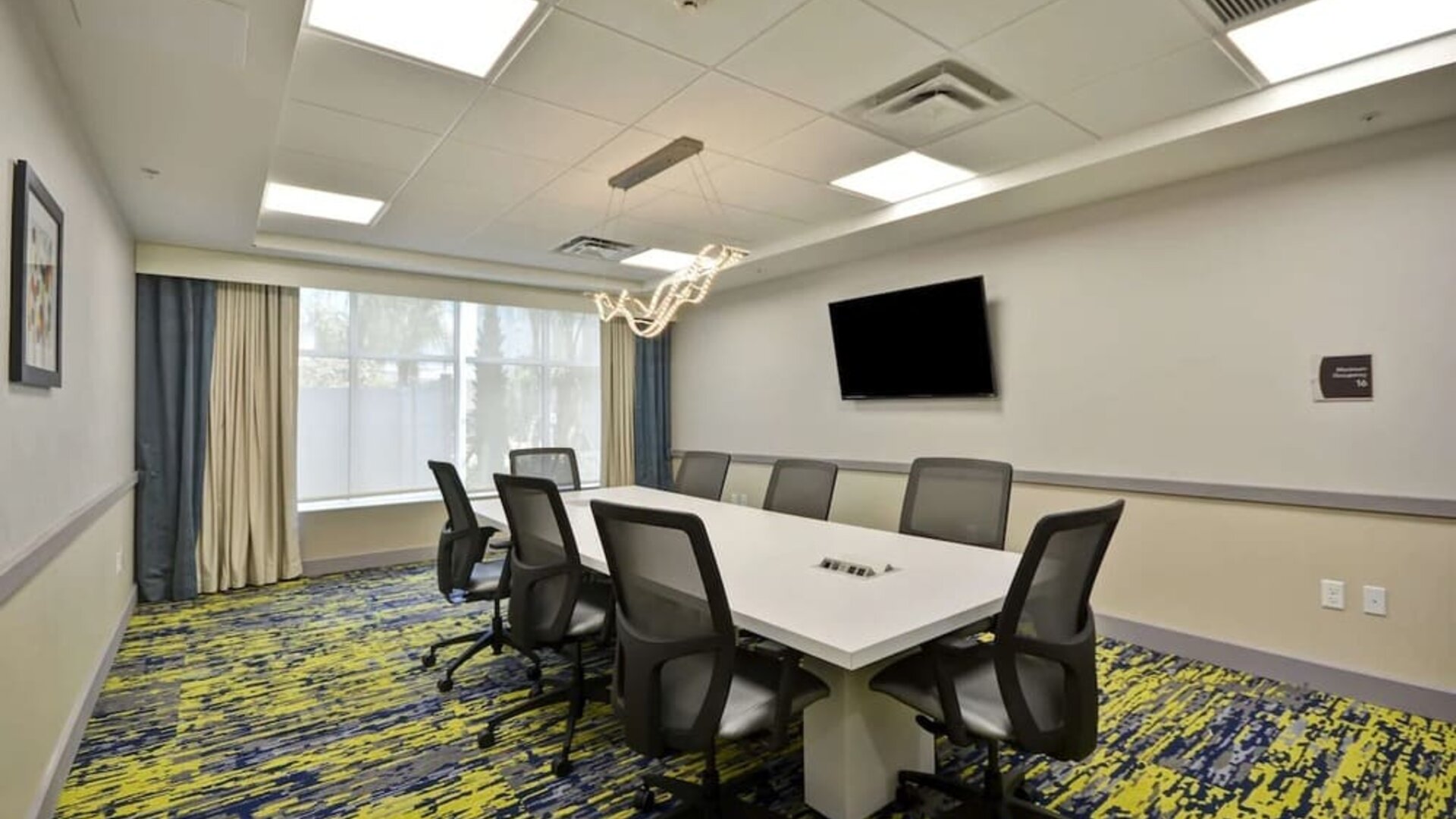 Meeting room at Homewood Suites By Hilton Orlando Theme Parks.