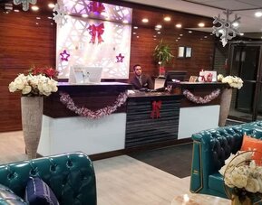 Reception desk at Baymont By Wyndham Montreal Airport.