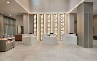 Reception desk at Embassy Suites By Hilton Atlanta Midtown.