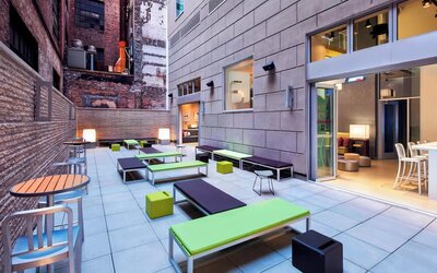 Terrace with natural light perfect for coworking at Aloft Manhattan Downtown - Financial District.