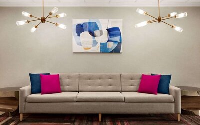 Lobby seating at La Quinta Inn & Suites By Wyndham Lackawanna.