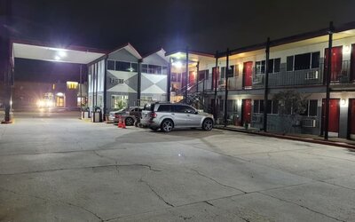 Parking available at Coratel Inn & Suites By Jasper Hutchinson.