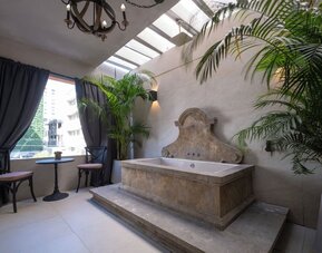 Hotel amenity hot tub at Olive Boutique Hotel.