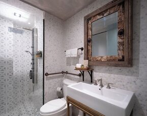 Guest bathroom at Olive Boutique Hotel.