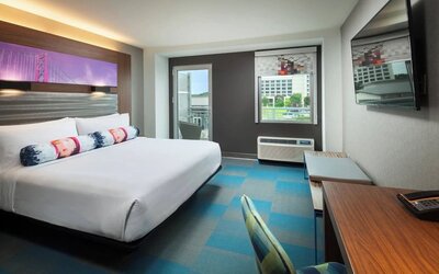 Day use room with balcony and work desk at Aloft SFO.