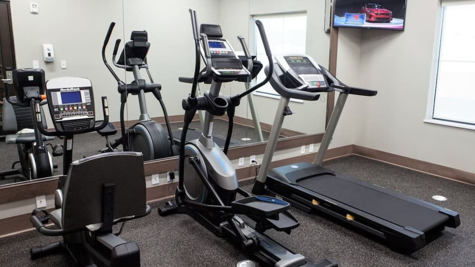 Gym at Days Inn & Suites By Wyndham Houston NW Cypress.