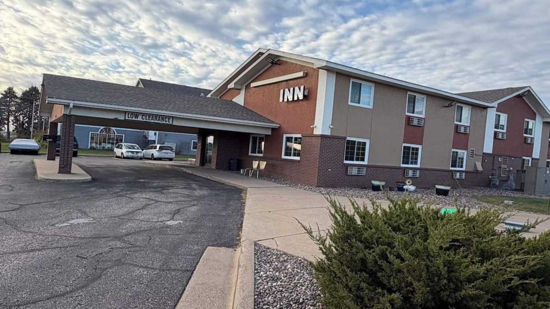 Hotel exterior at Coratel Inn And Suites By Jasper Stillwater.