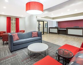 Lobby seating at Ramada By Wyndham Alpharetta/Atlanta North.