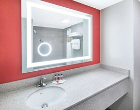 Guest bathroom at Ramada By Wyndham Alpharetta/Atlanta North.