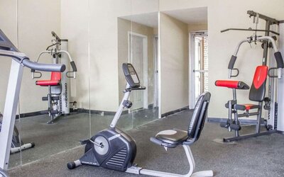 Fitness center at Rodeway Inn Huntington Station.