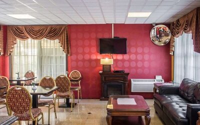 Lobby and coworking lounge at Rodeway Inn Huntington Station.