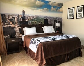 Day use room with natural light at Rodeway Inn Huntington Station.