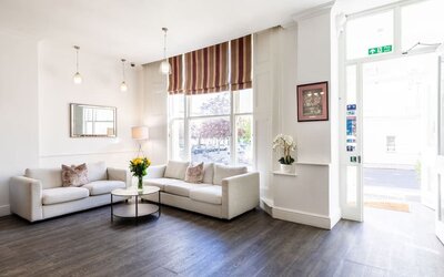 Lobby seating at The Chapter - Leisure Inn Hotel.