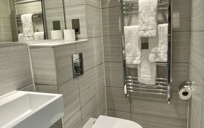 Guest bathroom at The Chapter - Leisure Inn Hotel.