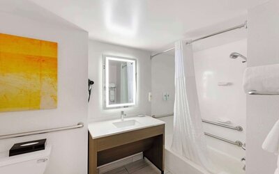 Private bathroom with tub at Comfort Inn & Suites Arlington Heights - Schaumburg.